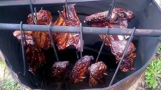 Hot smoking of pork ribs and meat at home.