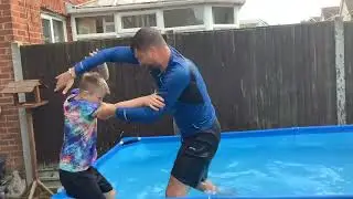 Destroying my dad in a swimming pool wrestling match