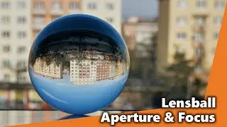 How do different apertures and focus points change the LENSBALL image?