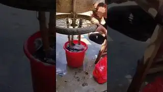 He has come up with a different way of washing two clothes 