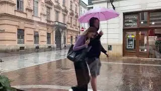 Relaxing cafe people watching on a rainy day Krakow 070822