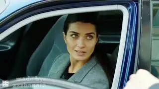 Tuba Buyukustun ( driving her cars )