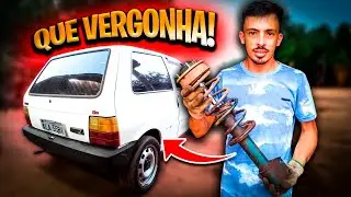 Trocando os amortecedores do uno