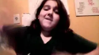 little sister playing with web cam.