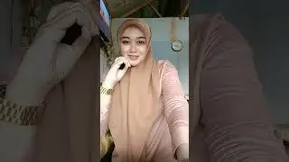 Beautiful, sweet, natural hijab mother live sitting relaxed, silent