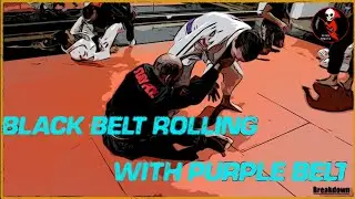 Black Belt rolling with purple belt