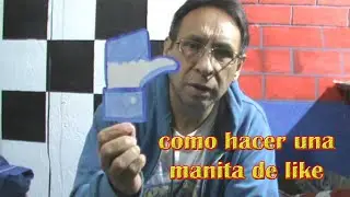 manita de like hecha de madera