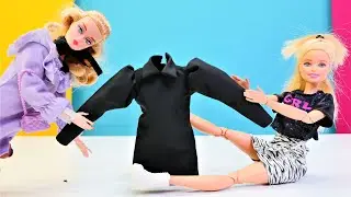 Barbie kuklası ve Laura arasında elbise temalı bir oyun sahnesi. Barbie kuklası ile oyun.