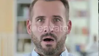 Close Up of Worried Young Man Feeling Shocked | Stock Footage - Envato elements
