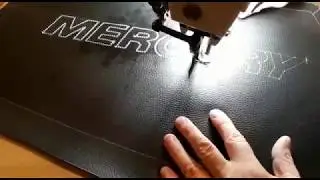 Вышивание логотипа на чехол для лодочного мотора Mercury.