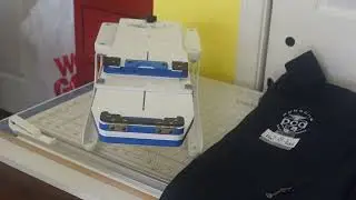 Embroidering a name under the logo of a jacket using the Brother 1055x snowman feature and template!