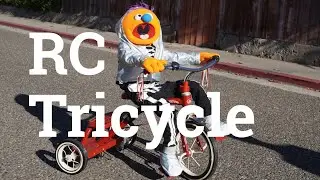 Remote Controlled Tricycle-Riding Puppet