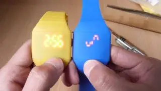 unboxing of blue  led watch with silicone strap