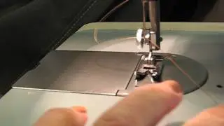 Threading the needle of a Dressmaker 2000. Video 