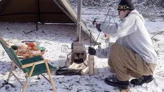 winter camping with a woodstove after heavy snow