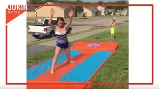Girl Faceplants After Split Attempt on Slip and Slide