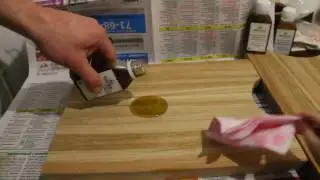 Покрытие маслом доски.