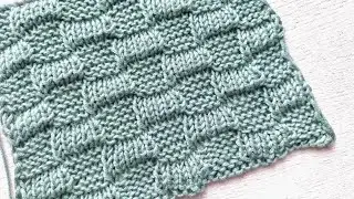 Interesting voluminous chess for knitting a sweater, blanket