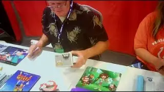 Goofy's Bill Farmer signing funkos