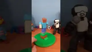 Стив герой игры Minecraft из пластилина с алмазной киркой на новом каркасе