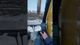 Cab view in a Komatsu 450 with a Labounty MSD4000R