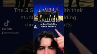 7 Spidermen holding Jon Watts like a baby