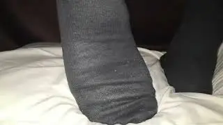 Stinky black socks trample pillow
