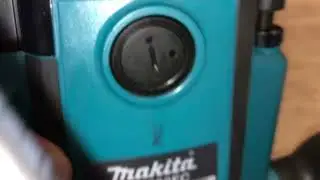 Фрезер вертикальный MAKITA RP 2303 FCXJ в чем. (2100 Вт,цанга 12 мм,22000 об/мин, регулировка об.)