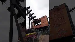 The Swarm going through a billboard at Thorpe park