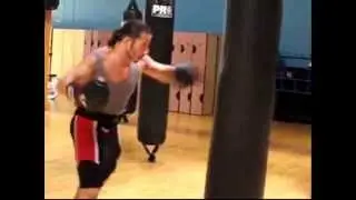 Kickboxing training Heavy Bag work  with weights Ronin Boushnak