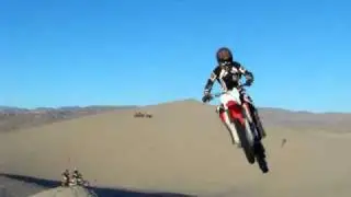 Son Nathaniel Holloween Jumping in the Mojave Dunes