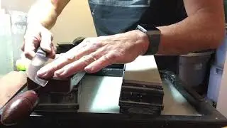 Deburr a kitchen knife while sharpening freehand
