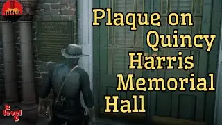 John finds the plaque with Arthur's name on Quincy Harris Memorial Hall in St. Denis 