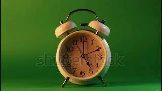 analog clock goes on a green screen, timelapse, fast passage of time.