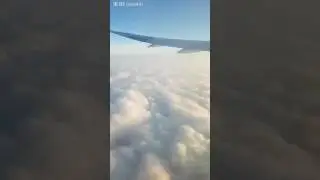 Triumph in the cloudy cotton skies with ANA Flight 全日空航空飞机上看棉花云海