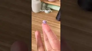 Crocheting a micro amigurumi octopus 