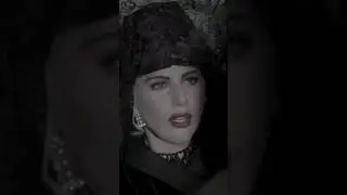 Lady Gaga with pink hair in a music video