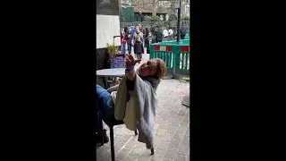 Russian woman in London blames the West for starting the war and praises Putin