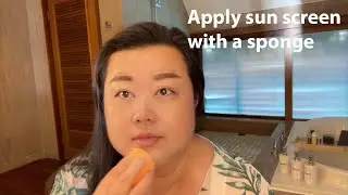 Applying sun screen with a sponge