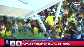 Another Angle of Soccer Fans Taking Down Barriers and Breaking Into the Stadium