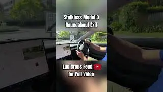 Exiting a 2-lane roundabout in stalkless 2024 Tesla Model 3