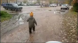 По лужам