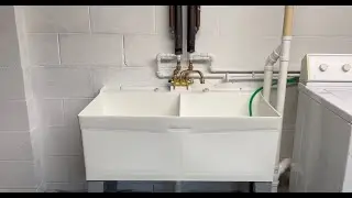 How I replaced a utility sink and added a washing machine standpipe.