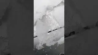 Scraping ice off my car (2 of 2)