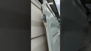 BREVE - Réparation changement de la serrure de fermeture haute sur la porte latérale