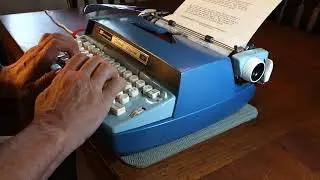 Smith-Corona Coronet 10 Electric typewriter at work
