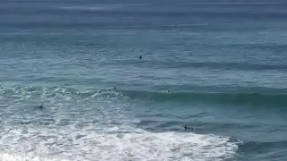 Surfer getting smashed by a wave in Encinitas, San Diego