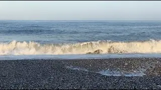 Peaceful Beautiful Soothing Ocean Waves Calmly Touching The Sandy Shoreline