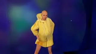 Yellow jacket with cycling movements (rubber raincoat fetish)