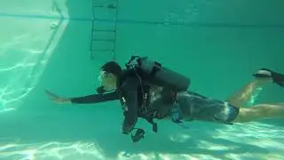 learn how demonstrate Swimming without mask in padi open water diving course